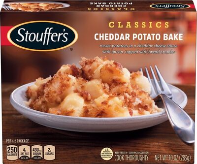 Cheddar Potato Bake Russet Potatoes In A Cheddar Cheese Sauce With Bacon, Topped With Bread Crumbs, Cheddar Potato Bake