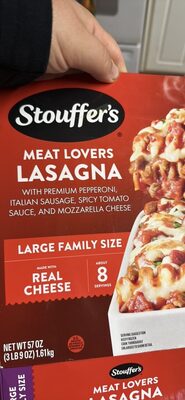 Meat Lovers Lasagna With A Hearty Tomato Sauce, Pepperoni Italian Sausage, Ground Beef And Pork, Meat Lovers Lasagna