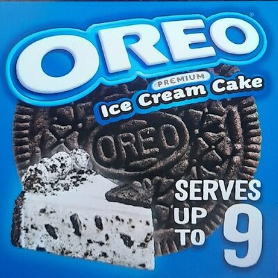 Creamy Vanilla Ice Cream Cake With Cookie Pieces Topped With Whipped Icing, Creamy Vanilla