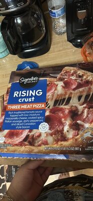 Three Meat Rich Traditional Tomato Sauce Topped With Low-Moisture Mozzarella Cheese, Cooked Spicy Italian Sausage, Zesty Pepperoni, And Diced Canadian Style Bacon Rising Crust Pizza, Three Meat