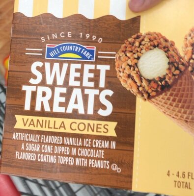 Vanilla Ice Cream In A Sugar Cone Dipped In Chocolate Flavored Coating Topped With Peanuts Sweet Treats Cones, Vanilla