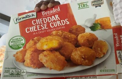 Breaded Cheddar Cheese Curds In A Crispy Golden Coating, Cheddar Cheese