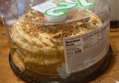 Layers Of Caramel Cake Topped With Delicious Caramel Buttrcreme, Caramel Chips And Caramel Drizzle, Caramel