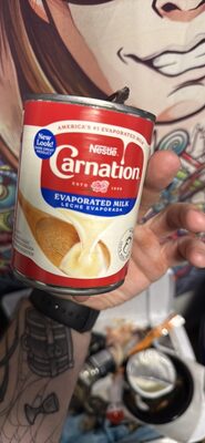 CARNATION Vitamin D Added Evaporated Milk 12 fl. oz. Can