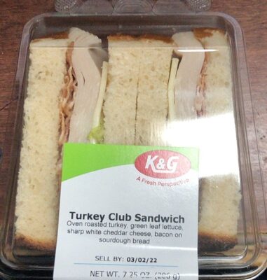 Turkey Club Oven Roasted Turkey Breast, Green Leaf Lettuce, Sharp White Cheddar Cheese, Bacon On Sourdough Bread Sandwich, Turkey