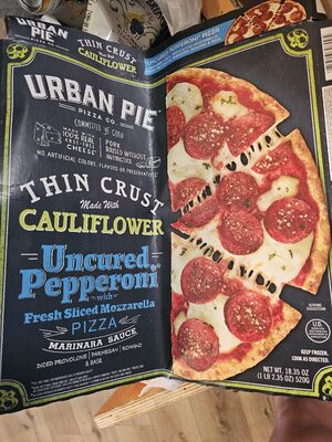 Uncured Pepperoni With Fresh Sliced Mozzarella Marinara Sauce, Diced Provolone, Parmesan, Romano & Basil Thin Crust Made With Cauliflower Pizza, Uncured Pepperoni