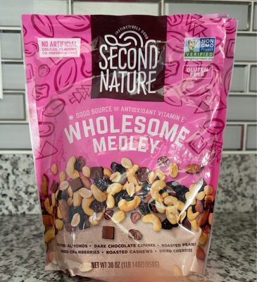 Wholesome Medley Roasted Almonds, Dark Chocolate Chunks, Roasted Peanuts, Dried Cranberries, Roasted Cashews, Dried Cherries, Wholesome Medley