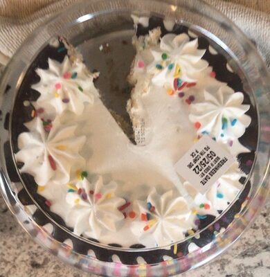 Confetti Cake Iced In White Buttercreme, Delicately Finished With A Chocolatey Pour And Fanciful Sprinkles, Confetti