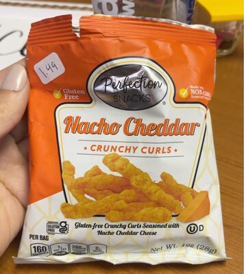 Nacho Cheddar Crunchy Corn Curls Seasoned With Nacho Cheddar Cheese, Nacho Cheddar