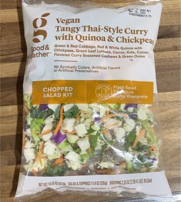 Vegan Tangy Thai-Style Curry With Quinoa & Chickpeas Green & Red Cabbage, Red & White Quinoa With Chickpeas, Green Leaf Lettuce, Carrot, Kale, Coconut Flavored Curry Seasoned Cashews & Green Onion Chopped Salad Kit With Plant-Based Thai-Style Curry Vinaig