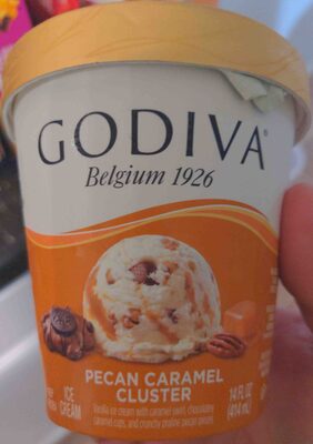Pecan Caramel Cluster Vanilla Ice Cream With Caramel Swirl, Chocolatey Caramel Cups, And Crunchy Praline Pecan Pieces, Pecan Caramel Cluster