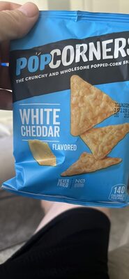 The Crunchy And Wholesome White Cheddar Flavored Popped-Corn Snack, White Cheddar